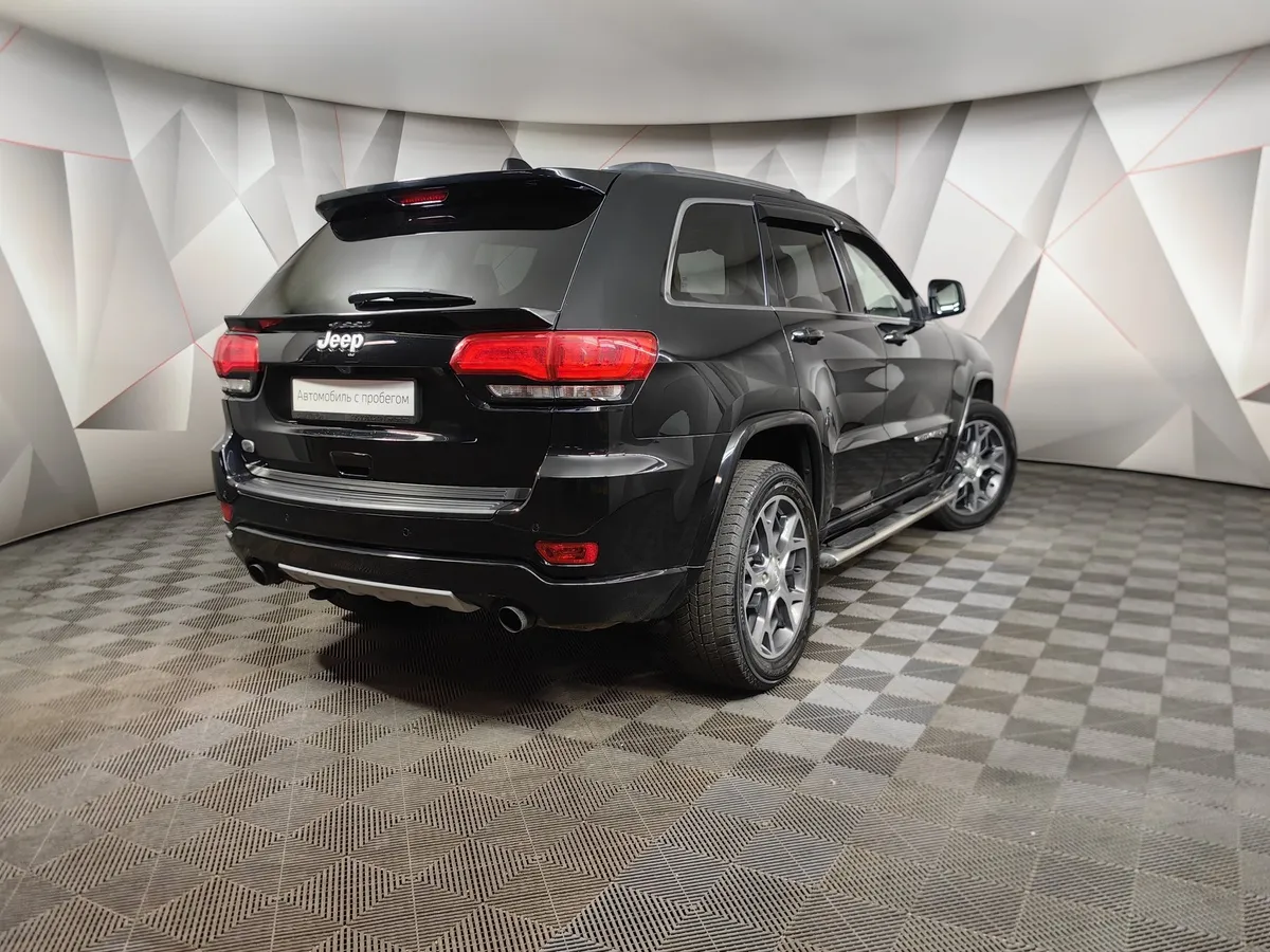Jeep Grand Cherokee 3.6 AT AWD (286 л.с.) Overland Черный в АВИЛОН. Слайд №2