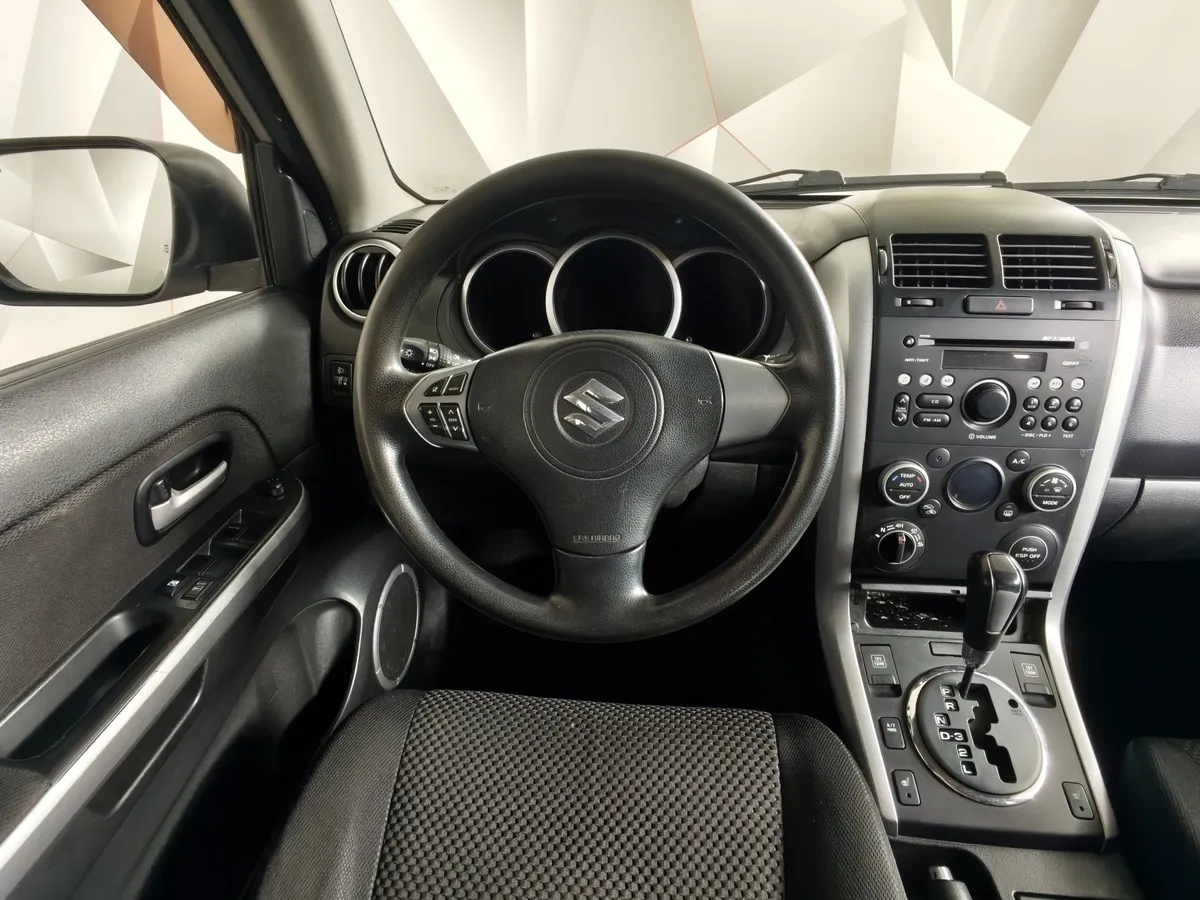 Suzuki Grand Vitara 2.4 AT AWD (169 л.с.) Серебристый в АВИЛОН. Слайд №19