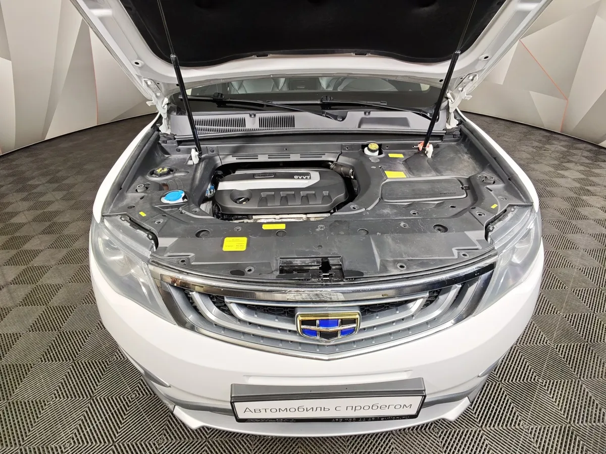 Geely Atlas 2.4 AT AWD (148 л.с.) Standard Белый в АВИЛОН. Слайд №11