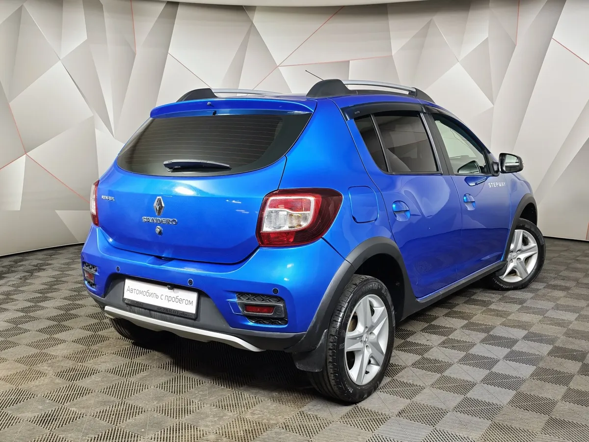 Renault Sandero 1.6 MT (113 л.с.) Stepway Drive Синий в АВИЛОН. Слайд №2