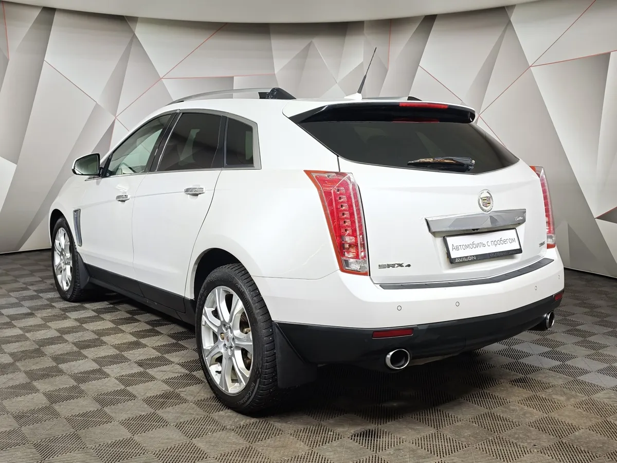 Cadillac SRX 3.6 AT AWD (318 л.с.) Белый в АВИЛОН. Слайд №4