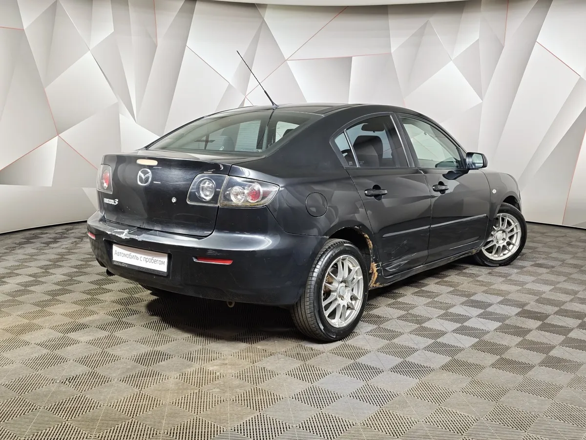 Mazda 3 1.6 AT (105 л.с.) Черный в АВИЛОН. Слайд №2