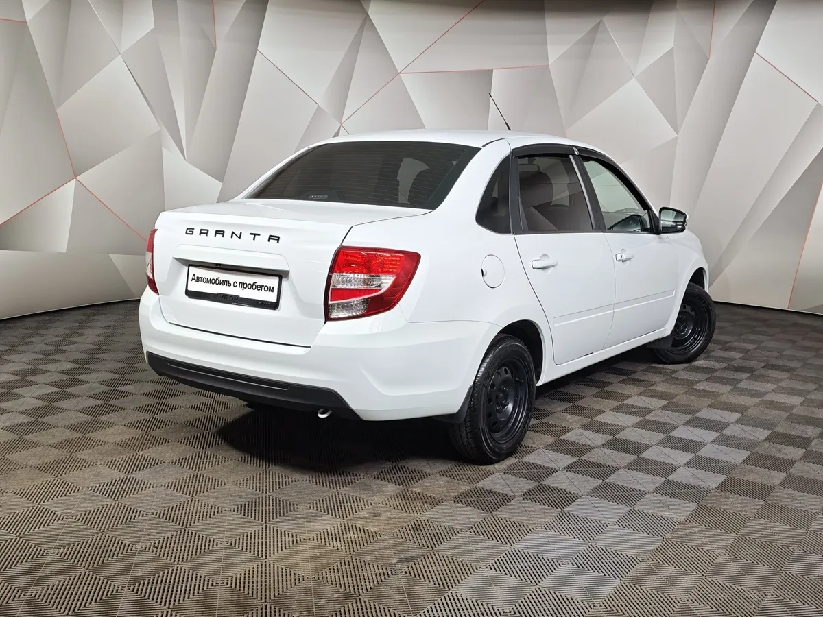 ВАЗ (Lada) Granta 1.6 MT 8кл (87 л.с.) Белый в АВИЛОН. Слайд №2