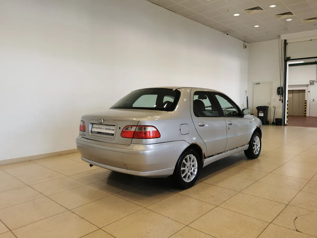 Fiat Albea 1.4 MT (77 л.с.) Серебристый в АВИЛОН. Слайд №2
