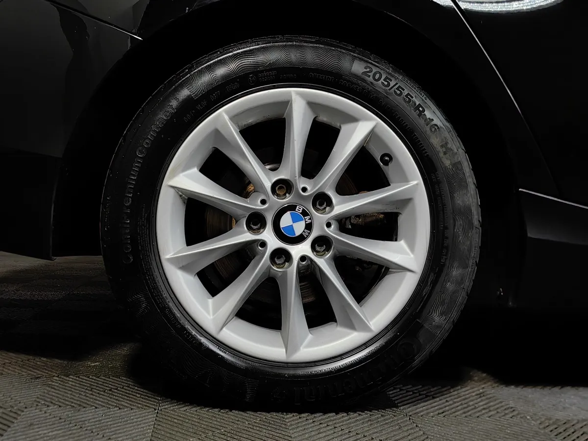 BMW 1 серия 116i AT (136 л.с.) Черный в АВИЛОН. Слайд №7