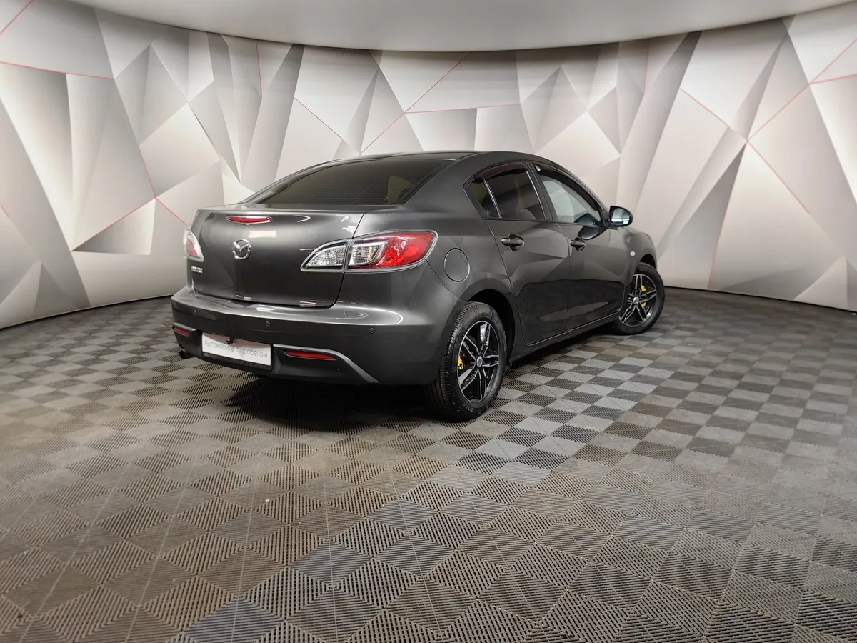 Mazda 3 1.6 AT (105 л.с.) Серый в АВИЛОН. Слайд №2