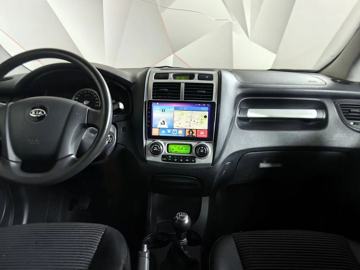 Kia Sportage 2.0 CRDi AT 4WD (112 л.с.) Серебристый в АВИЛОН. Слайд №14