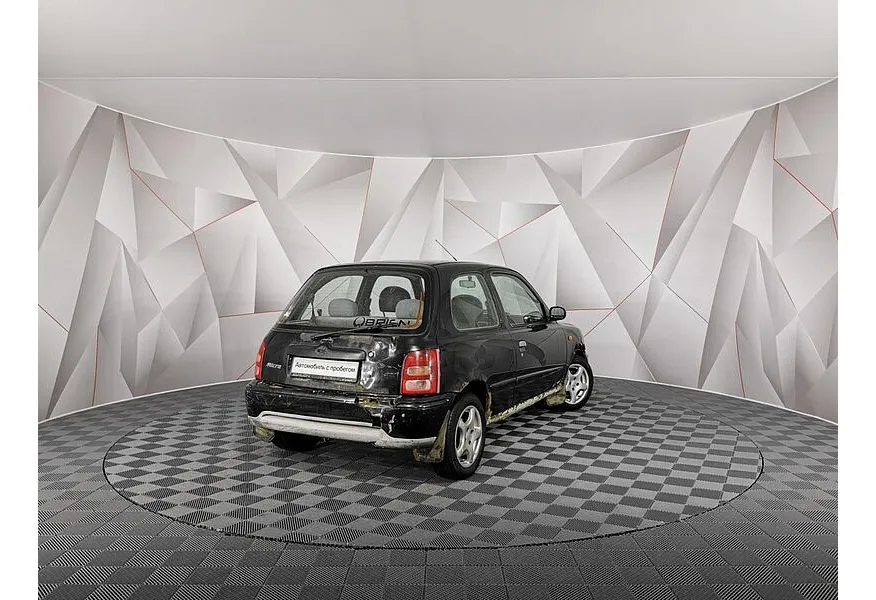 Nissan Micra 1.0 MT (60 л.с.) Черный в АВИЛОН. Слайд №2