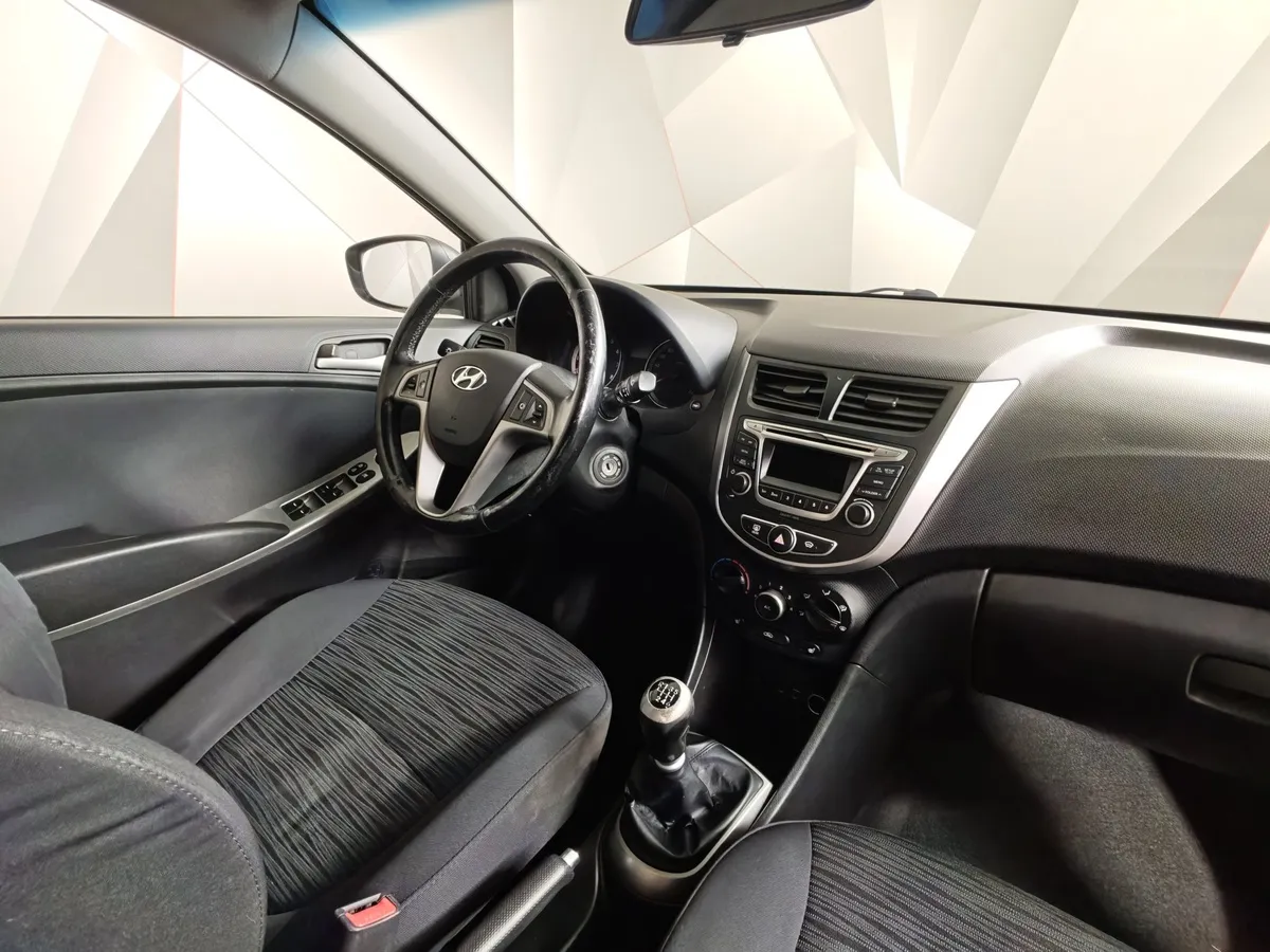 Hyundai Solaris 1.6 MT (123 л.с.) Comfort Белый в АВИЛОН. Слайд №12