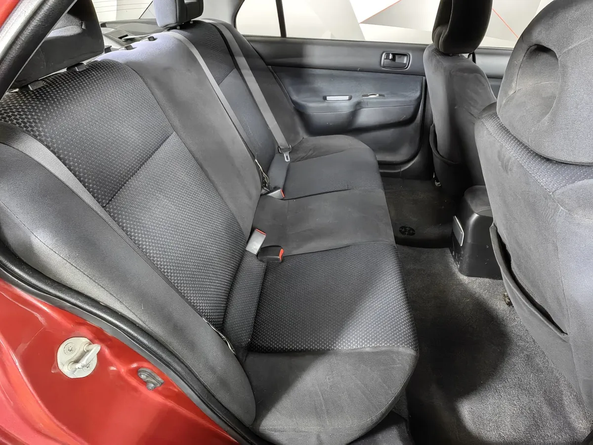 Mitsubishi Lancer 1.6 AT (98 л.с.) Красный в АВИЛОН. Слайд №11