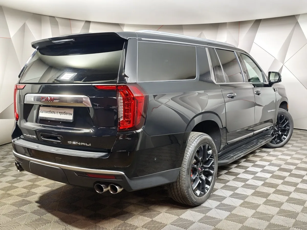 GMC Yukon 6.2 AT 4WD (426 л.с.) 7 мест Denali Ultimate Черный в АВИЛОН. Слайд №2