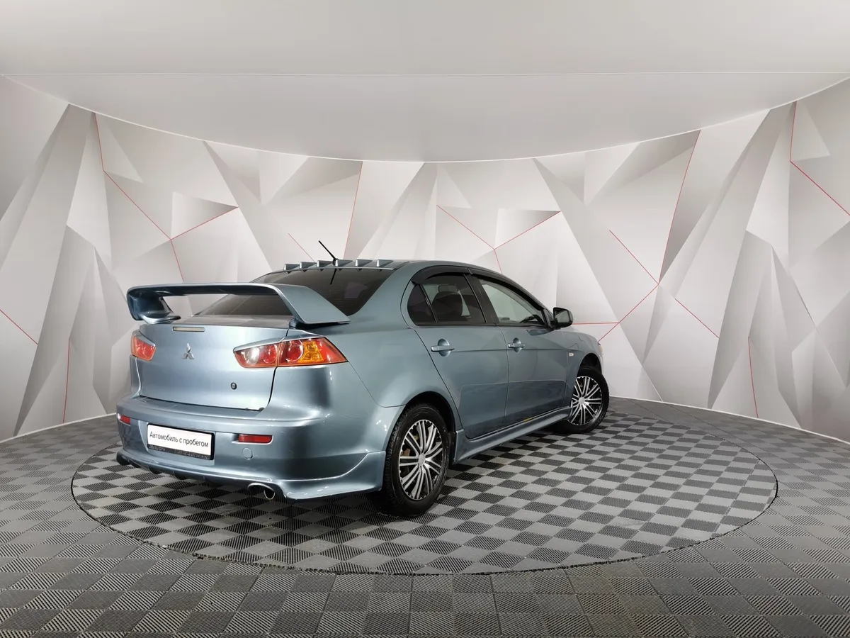 Mitsubishi Lancer 1.6 AT (117 л.с.) Зеленый в АВИЛОН. Слайд №2
