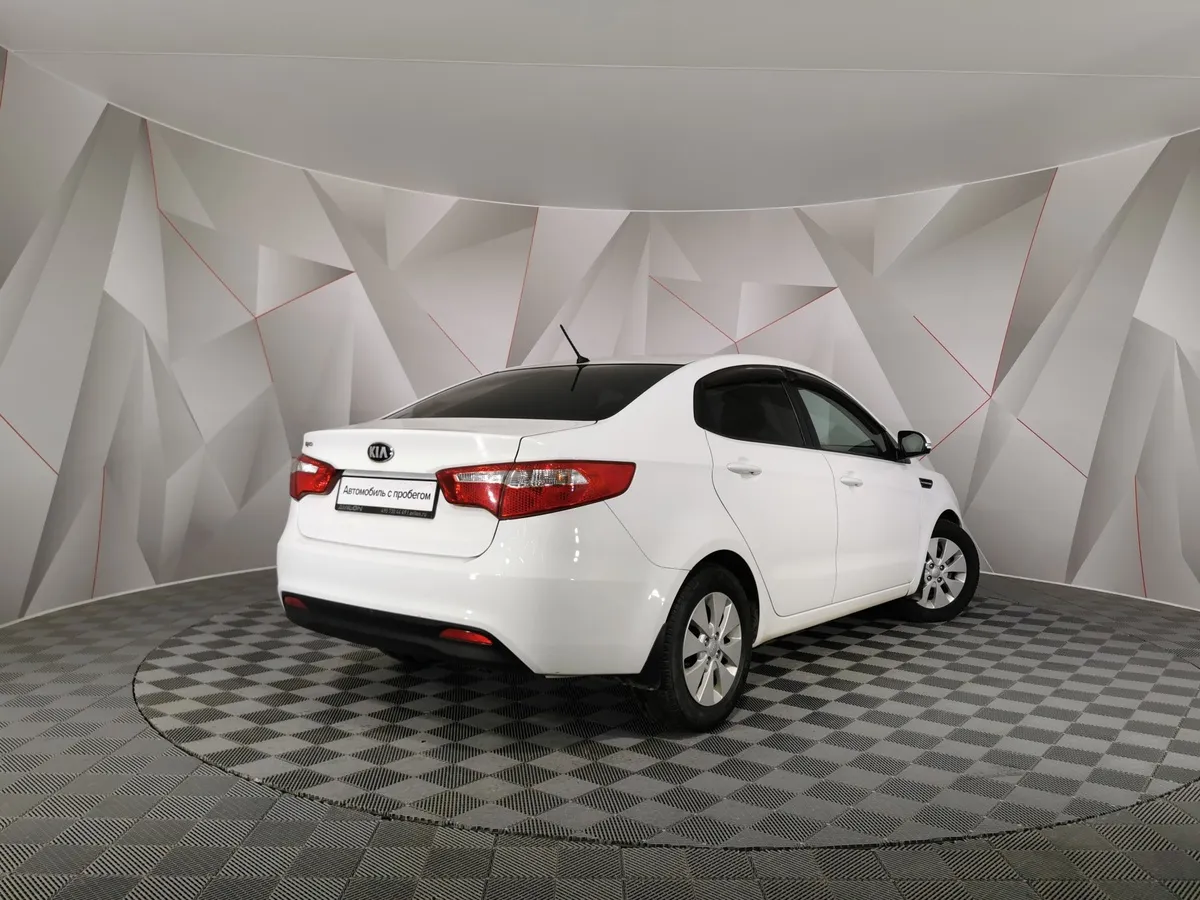 Kia Rio 1.6 AT (123 л.с.) Белый в АВИЛОН. Слайд №2
