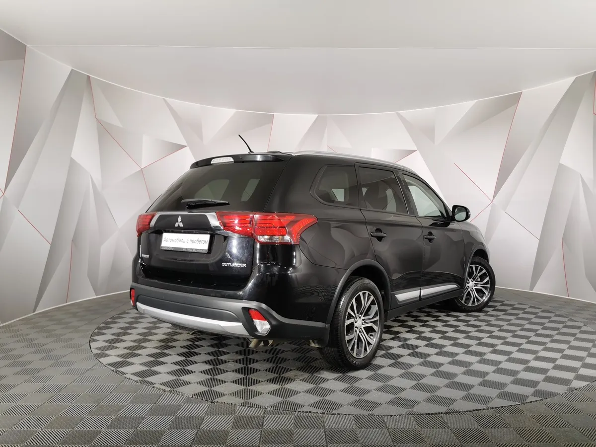 Mitsubishi Outlander 2.0 MIVEC CVT 4WD (146 л.с.) Invite Черный в АВИЛОН. Слайд №2