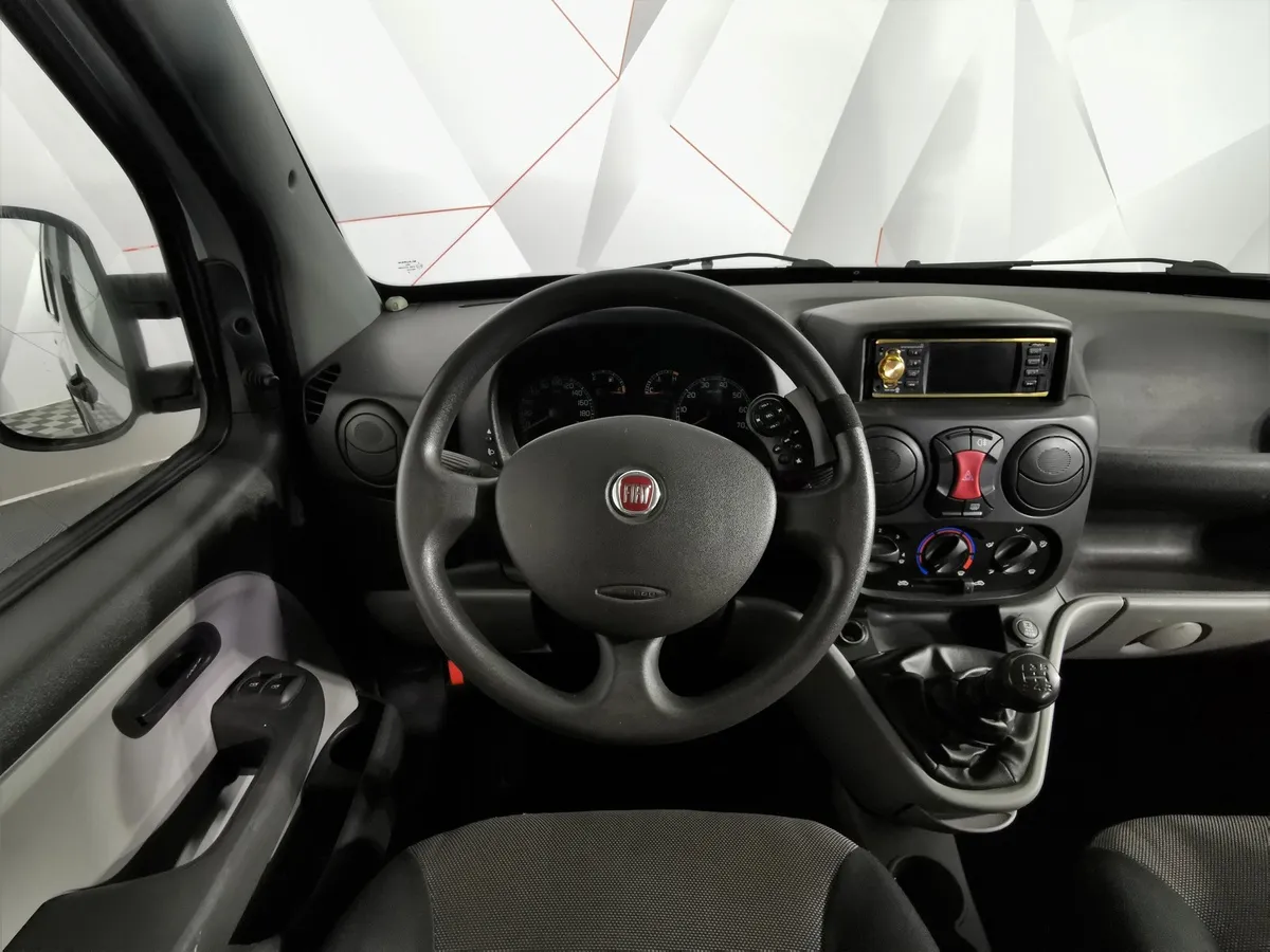 Fiat Doblo 1.4 MT FWD (78 л.с.) Серый в АВИЛОН. Слайд №18