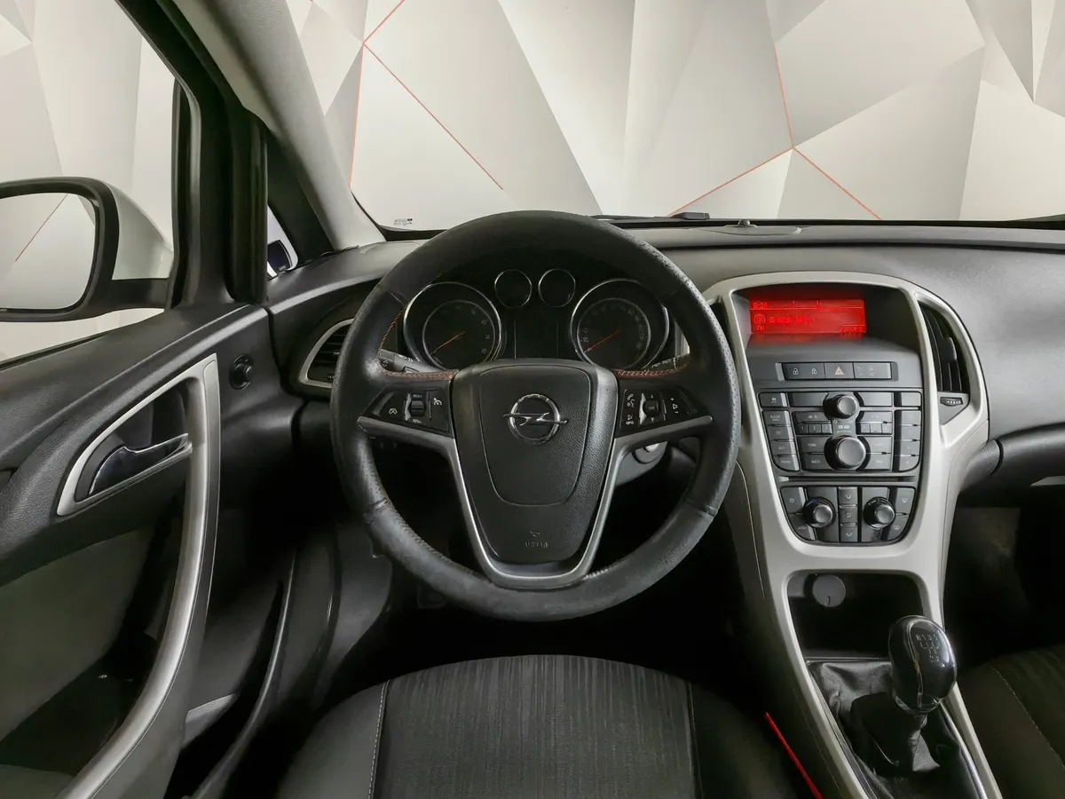 Opel Astra 1.6 MT (115 л.с.) Белый в АВИЛОН. Слайд №19