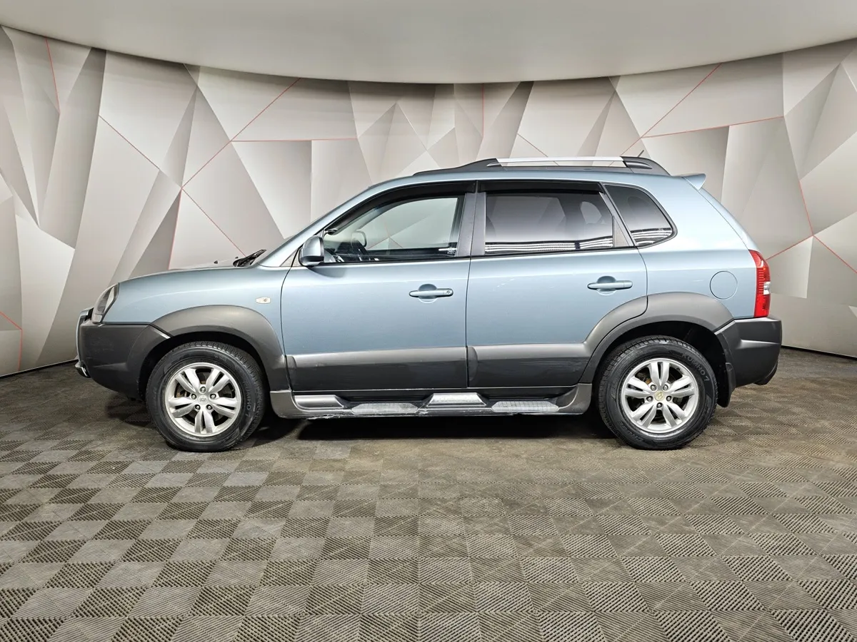 Hyundai Tucson 2.0 CRDI AT 2WD (112 л.с.) Голубой в АВИЛОН. Слайд №5