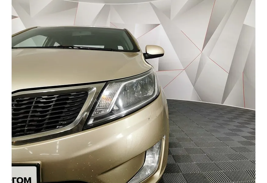 Kia Rio 1.6 AT (123 л.с.) Бежевый в АВИЛОН. Слайд №10