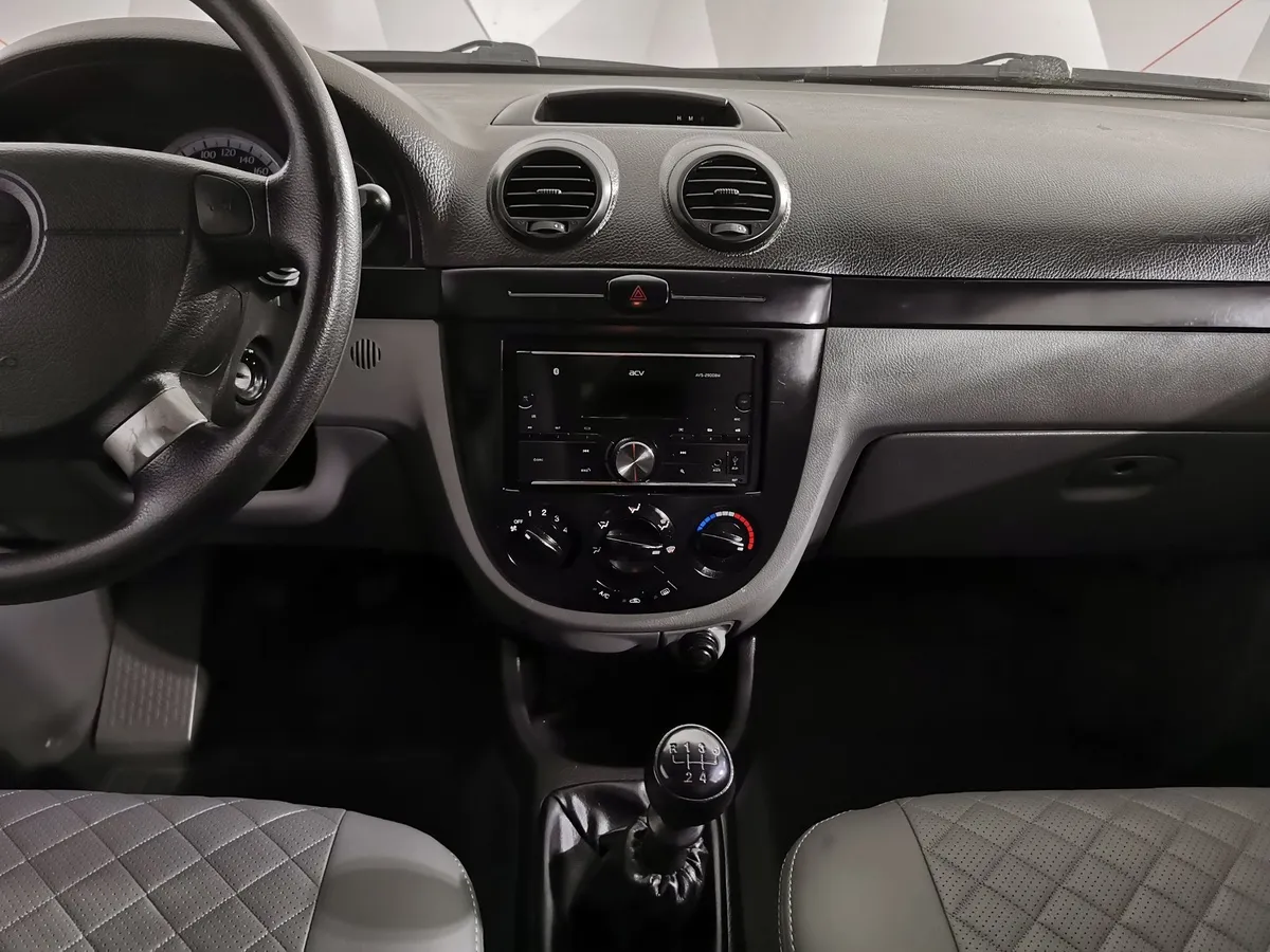 Chevrolet Lacetti 1.6 MT (109 л.с.) Белый в АВИЛОН. Слайд №14