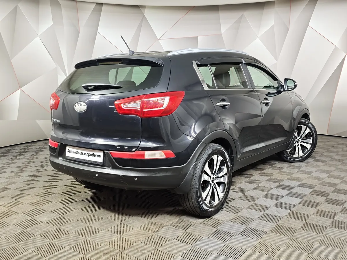 Kia Sportage 2.0 AT AWD (150 л.с.) Черный в АВИЛОН. Слайд №2