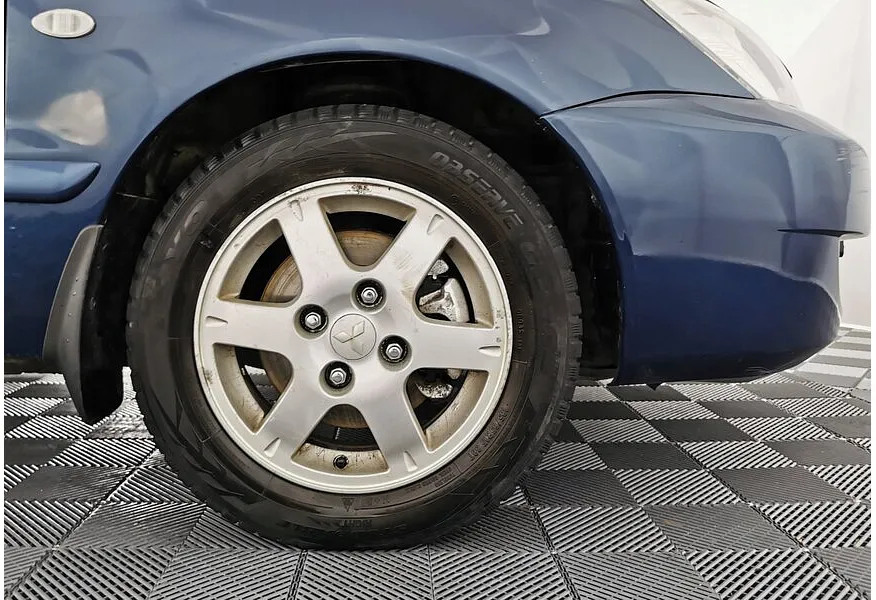 Mitsubishi Lancer 1.6 MT (100 л.с.) Синий в АВИЛОН. Слайд №19