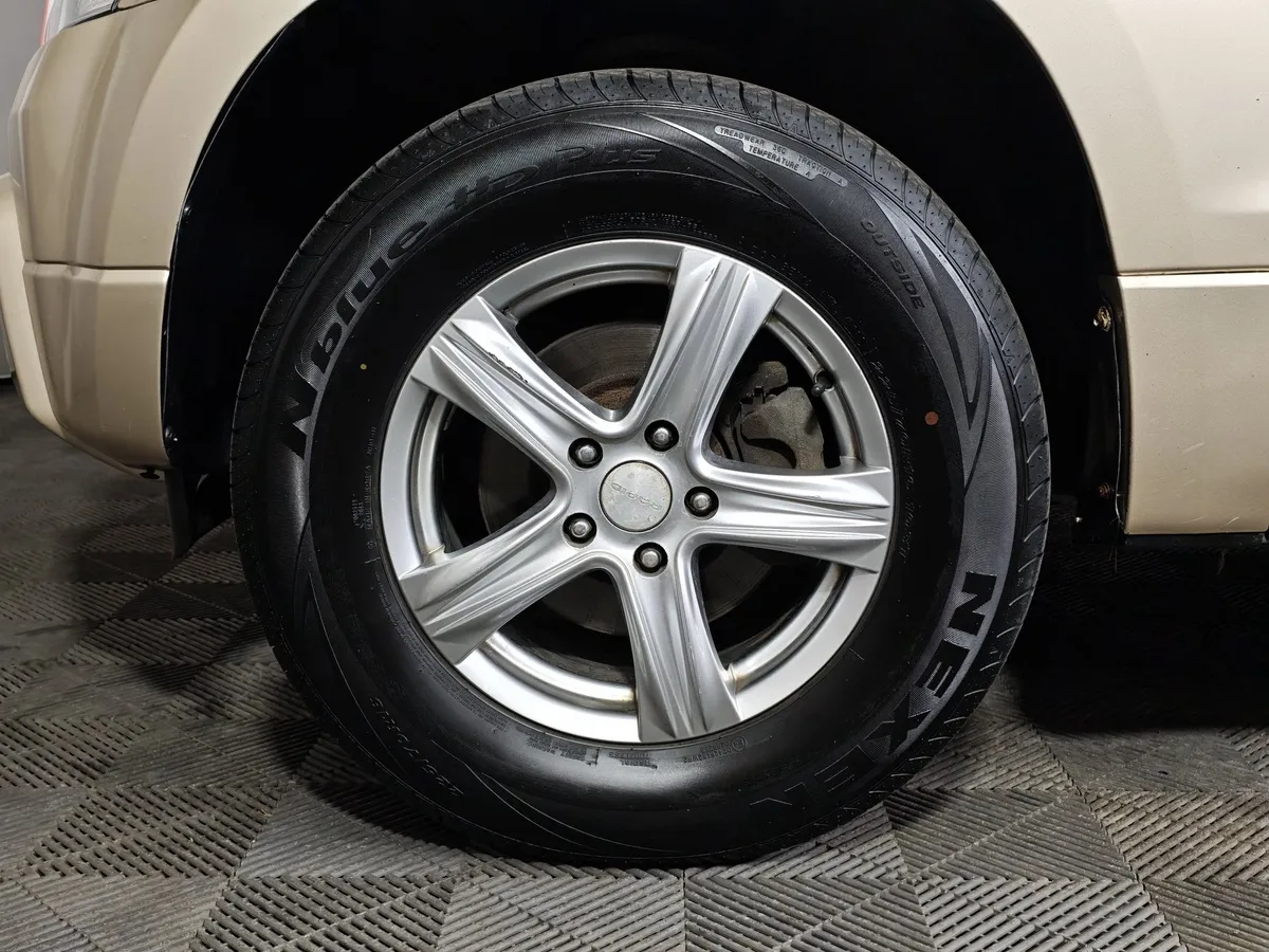 Suzuki Grand Vitara 2.0 AT AWD (140 л.с.) Бежевый в АВИЛОН. Слайд №9