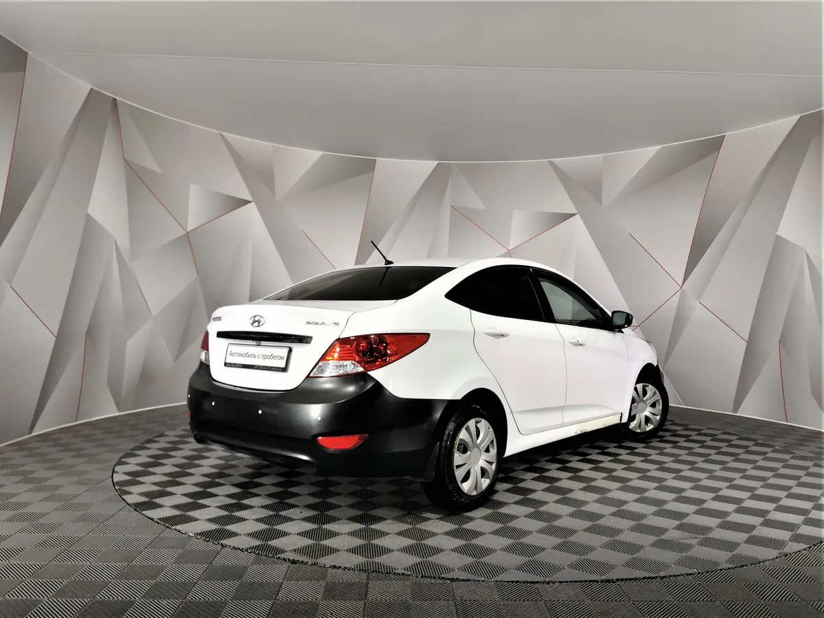 Hyundai Solaris 1.6 AT (123 л.с.) Elegance Белый в АВИЛОН. Слайд №2