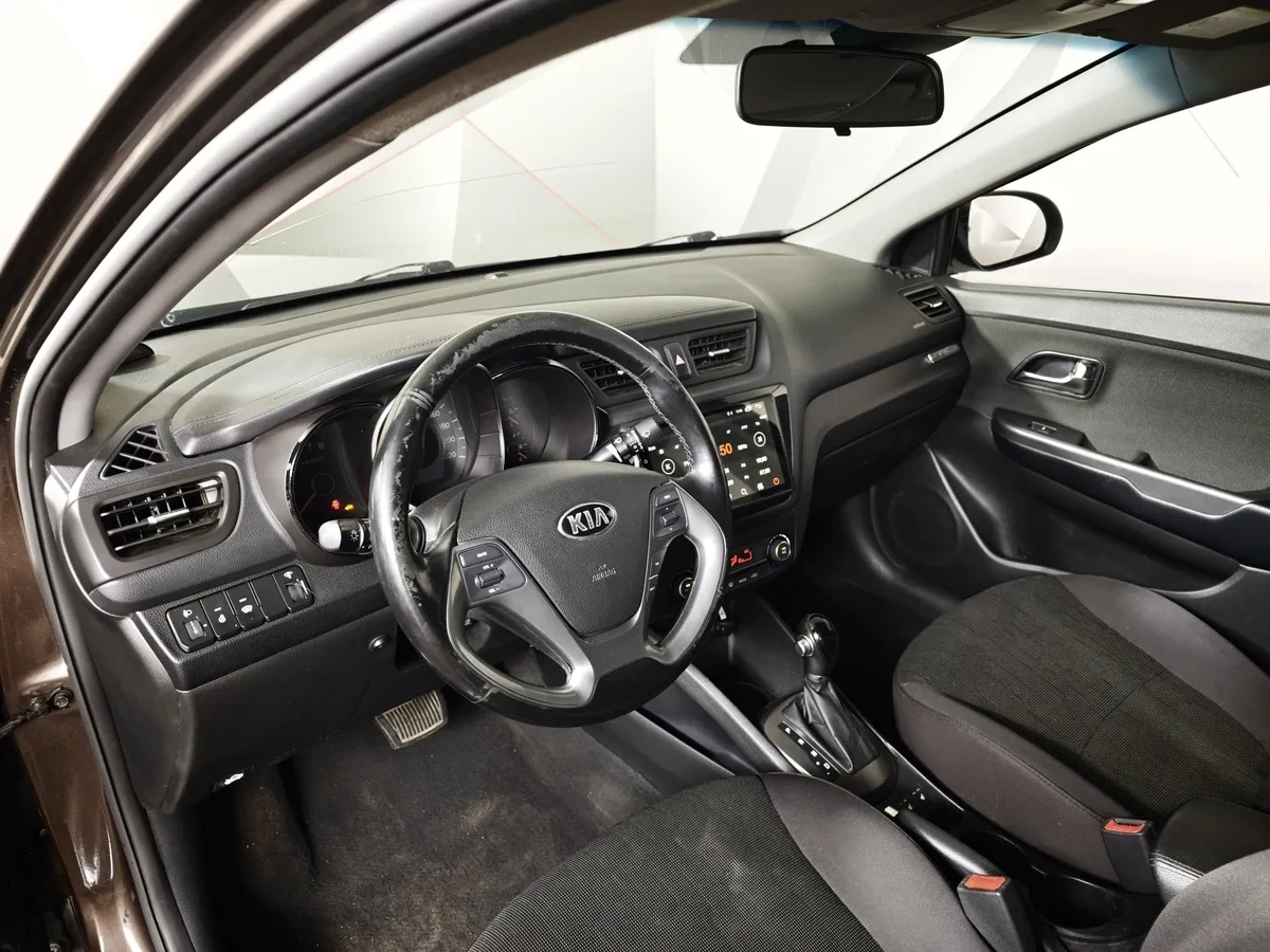 Kia Rio 1.6 AT (123 л.с.) Prestige Коричневый в АВИЛОН. Слайд №16