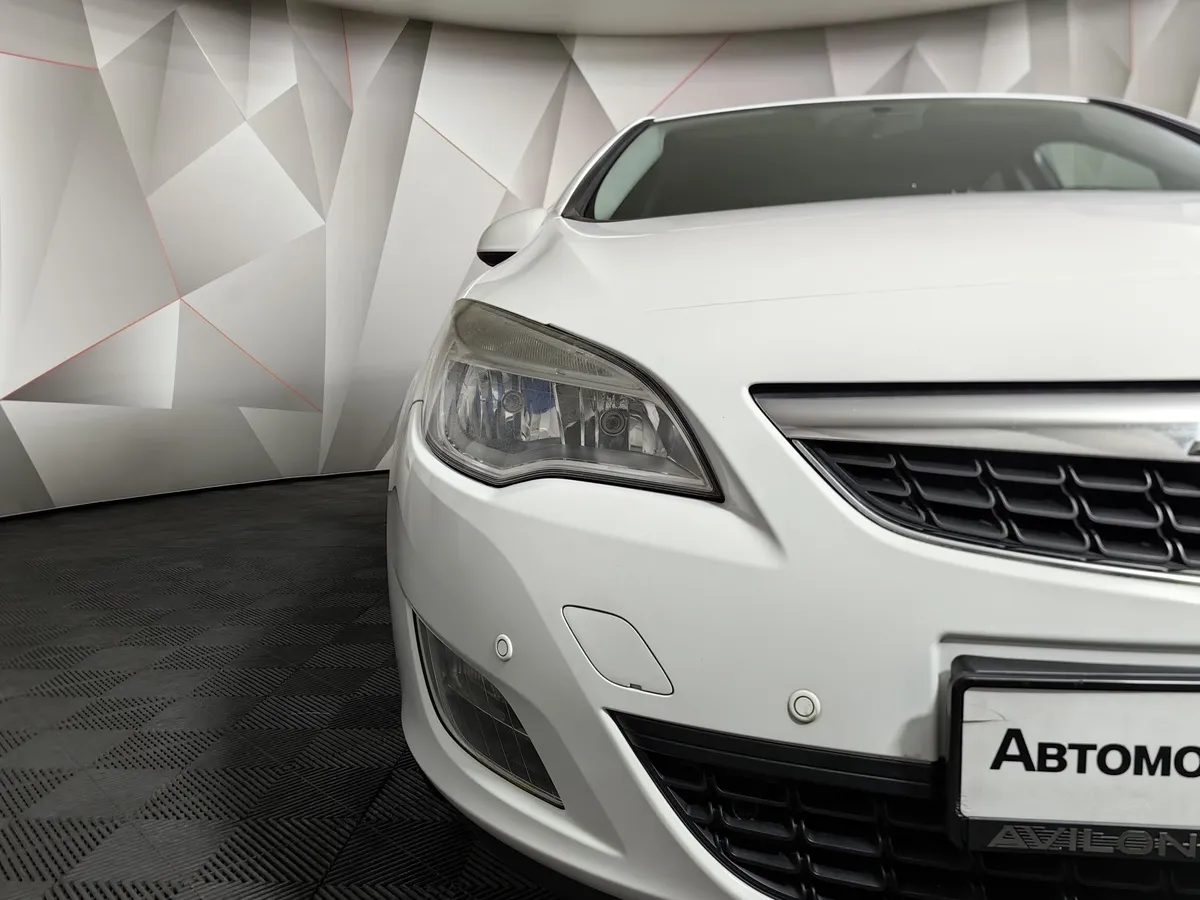 Opel Astra 1.6 MT (115 л.с.) Белый в АВИЛОН. Слайд №10