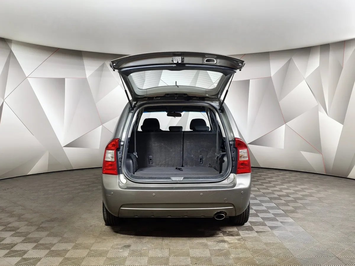 Kia Carens 2.0 AT (145 л.с.) Серый в АВИЛОН. Слайд №12