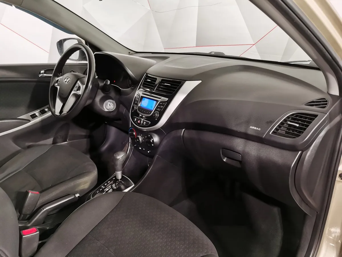 Hyundai Solaris 1.6 AT (123 л.с.) Dynamic Бежевый в АВИЛОН. Слайд №11