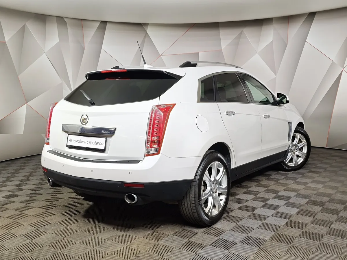 Cadillac SRX 3.0 AT (249 л.с.) Белый в АВИЛОН. Слайд №2