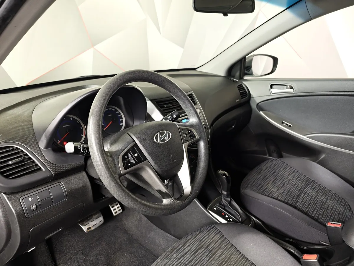 Hyundai Solaris 1.6 AT (123 л.с.) Comfort Черный в АВИЛОН. Слайд №16