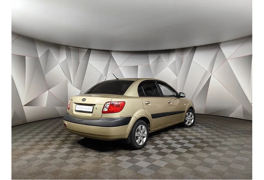 Kia Rio 1.4 AT (107 л.с.) Бежевый в АВИЛОН. Слайд №2