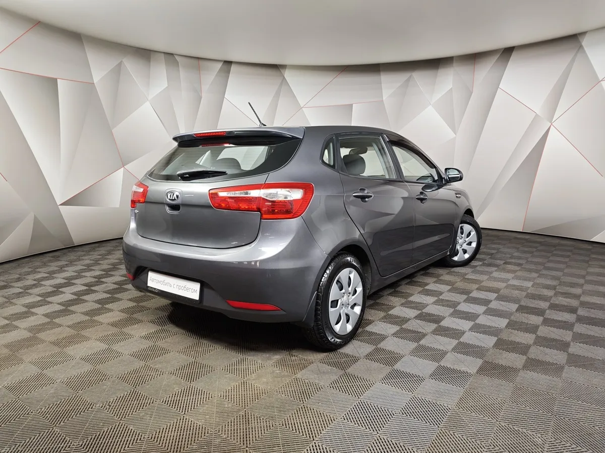 Kia Rio 1.4 MT (107 л.с.) Серый в АВИЛОН. Слайд №2