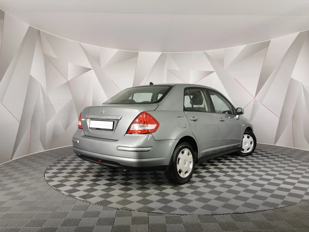 Nissan Tiida 1.6 AT (110 л.с.) Серый в АВИЛОН. Слайд №2
