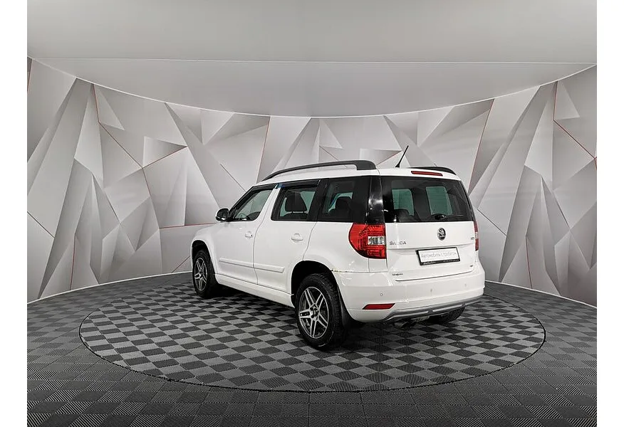 Skoda Yeti 1.8 TSI 4x4 DSG (152 л.с.) Белый в АВИЛОН. Слайд №4