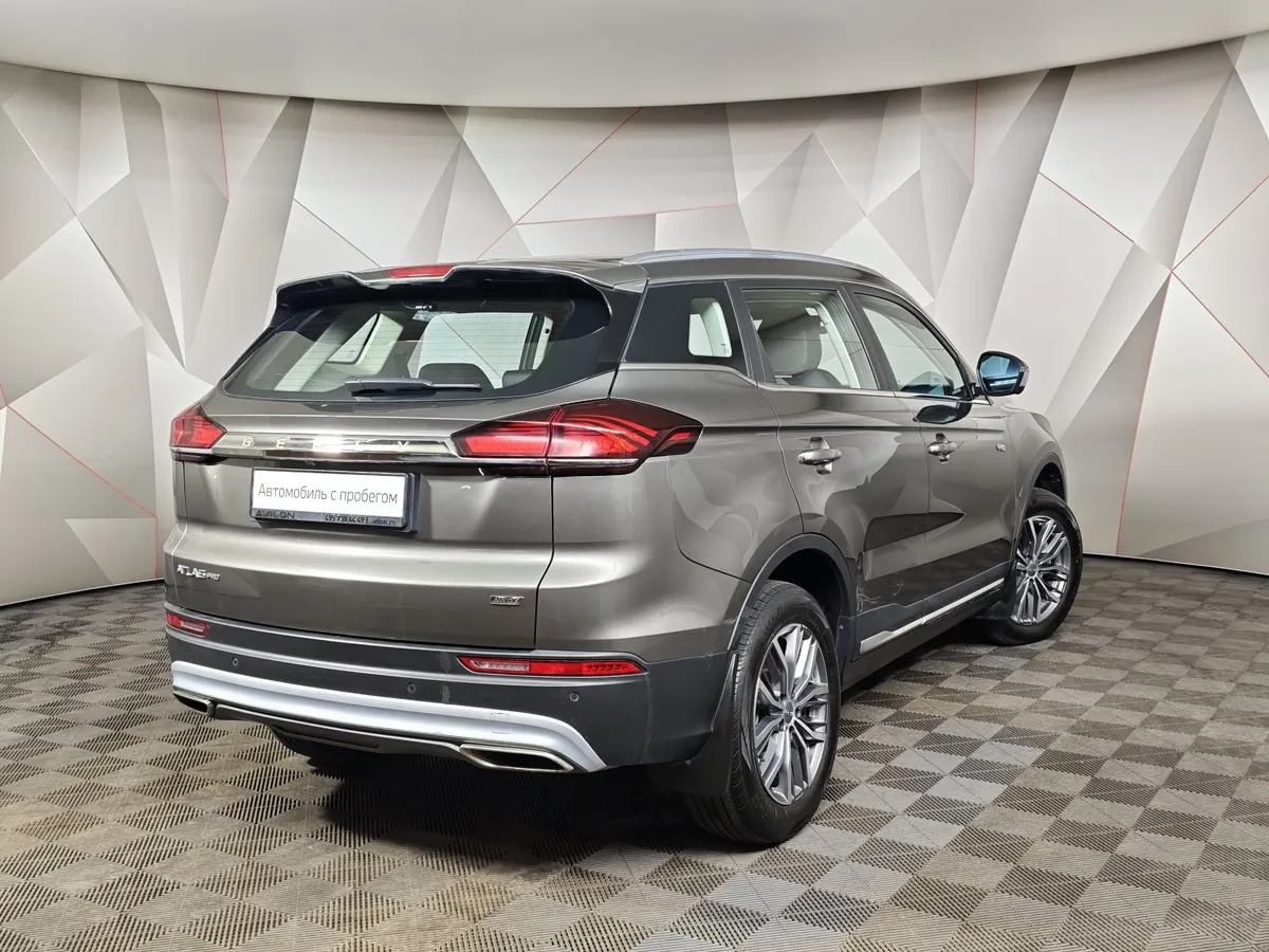 Geely Atlas Pro 1.5T 7DCT AWD (177 л.с.) Flagship Серый в АВИЛОН. Слайд №2