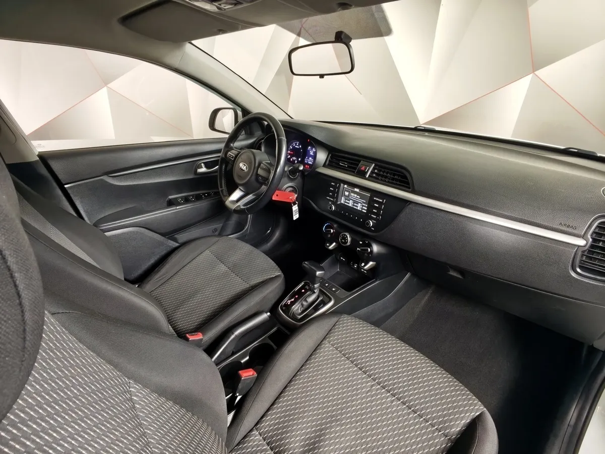 Kia Rio 1.6 AT (123 л.с.) Белый в АВИЛОН. Слайд №12