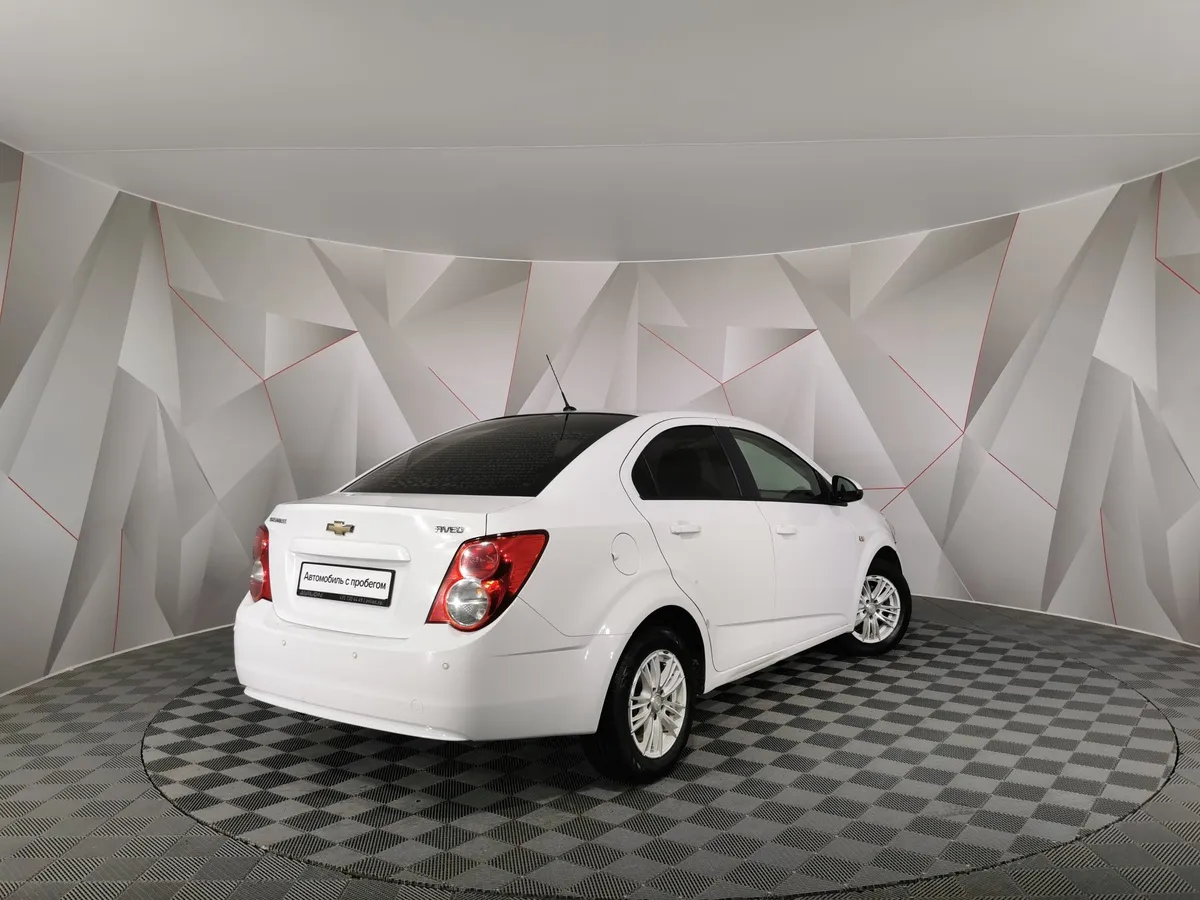 Chevrolet Aveo 1.6 AT (115 л.с.) Белый в АВИЛОН. Слайд №2