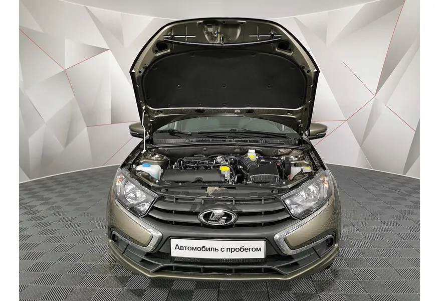 ВАЗ (Lada) Granta 1.6 MT 16 кл (106 л.с.) Коричневый в АВИЛОН. Слайд №11