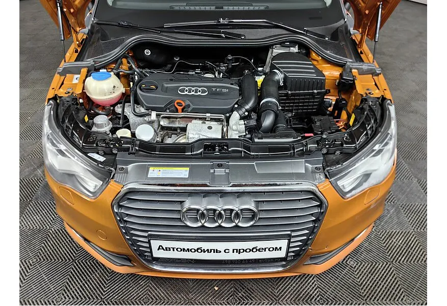 Audi A1 1.4 TFSI S-tronic (122 л.с.) Оранжевый в АВИЛОН. Слайд №10 Audi A1 1.4 TFSI S-tronic (122 л.с.) Оранжевый в АВИЛОН. Слайд №10