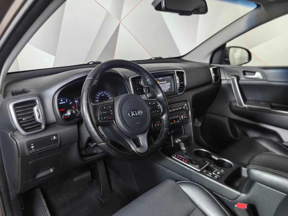 Kia Sportage 2.0 AT AWD (150 л.с.) Flagship Edition Коричневый в АВИЛОН. Слайд №19