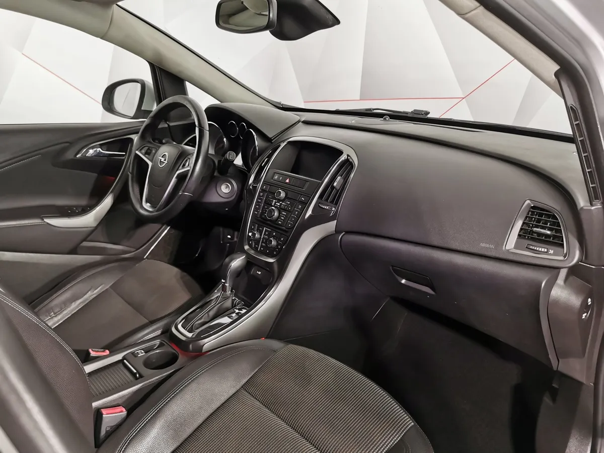 Opel Astra 1.6 AT (115 л.с.) Серебристый в АВИЛОН. Слайд №11