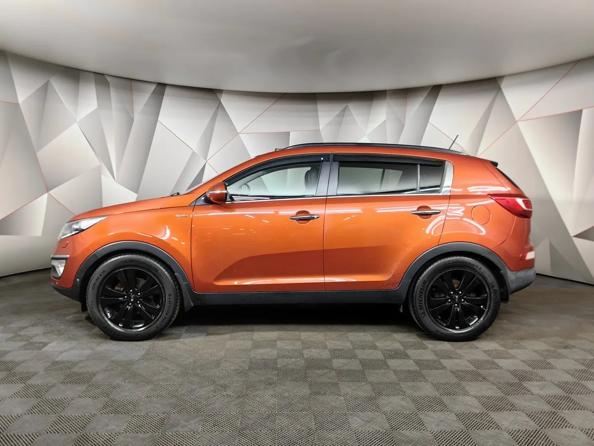 Kia Sportage 2.0 AT AWD (150 л.с.) Оранжевый в АВИЛОН. Слайд №5