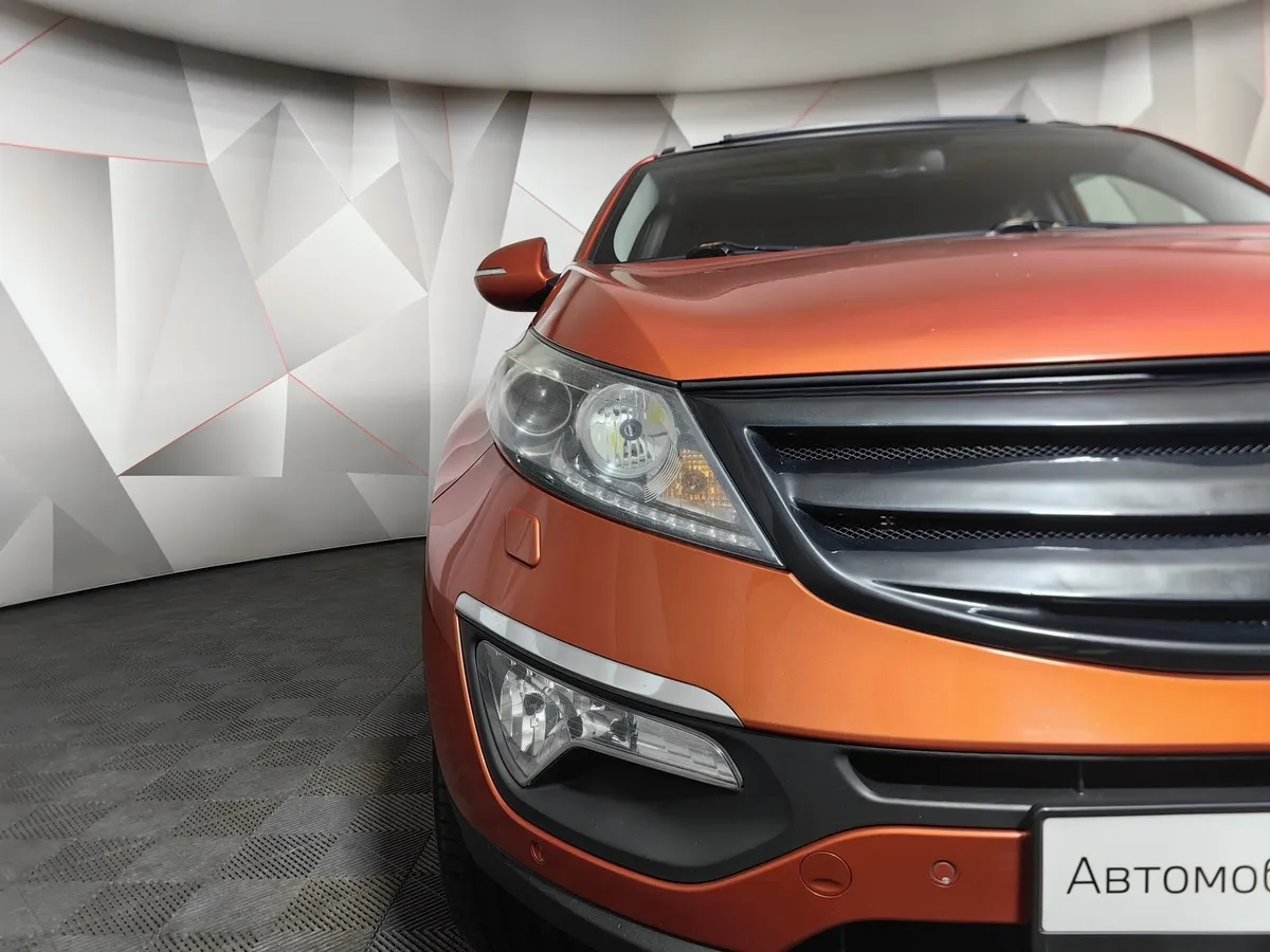 Kia Sportage 2.0 AT AWD (150 л.с.) Оранжевый в АВИЛОН. Слайд №10