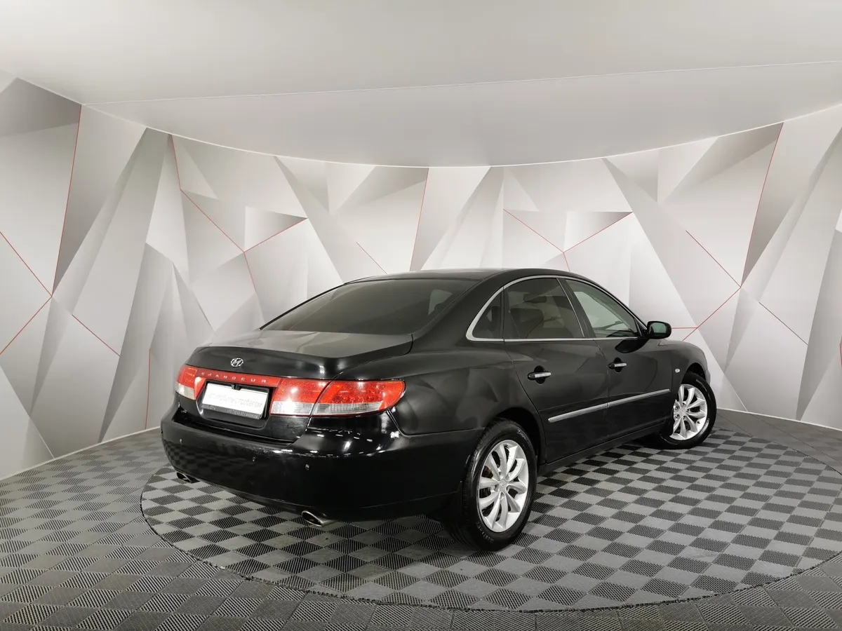 Hyundai Grandeur 2.7 AT (192 л.с.) Черный в АВИЛОН. Слайд №2