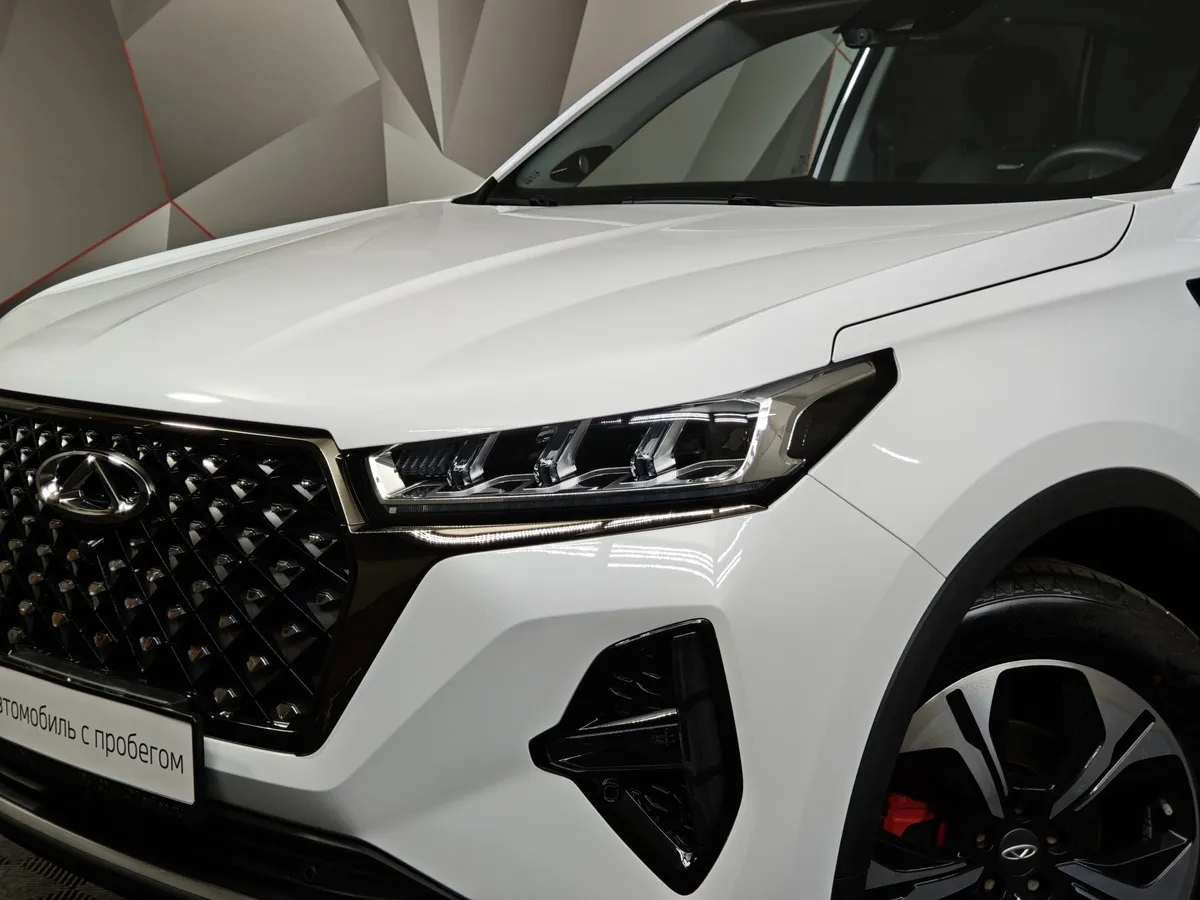 Chery Tiggo 7 Pro Max 1.6 7DCT 4WD (150 л.с.) Ultimate Белый в АВИЛОН. Слайд №10