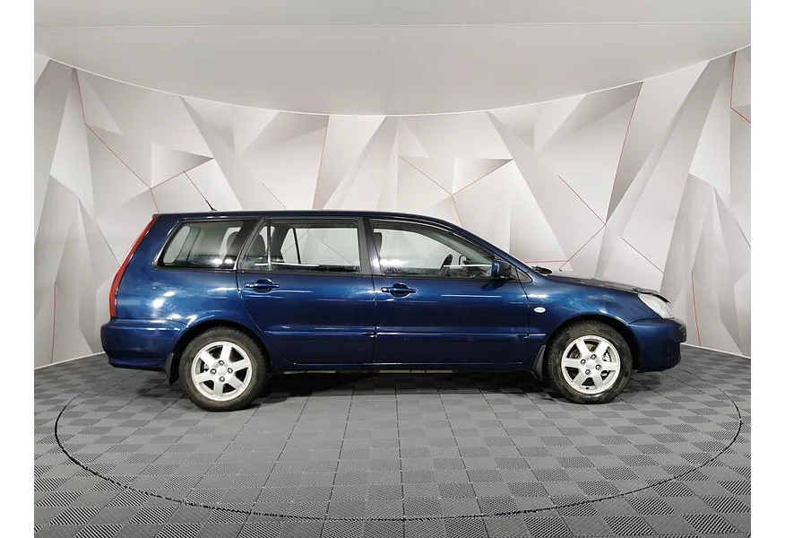Mitsubishi Lancer 1.6 MT (100 л.с.) Синий в АВИЛОН. Слайд №4