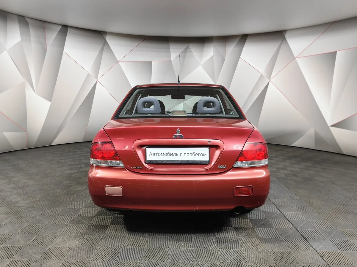 Mitsubishi Lancer 1.6 AT (98 л.с.) Красный в АВИЛОН. Слайд №8